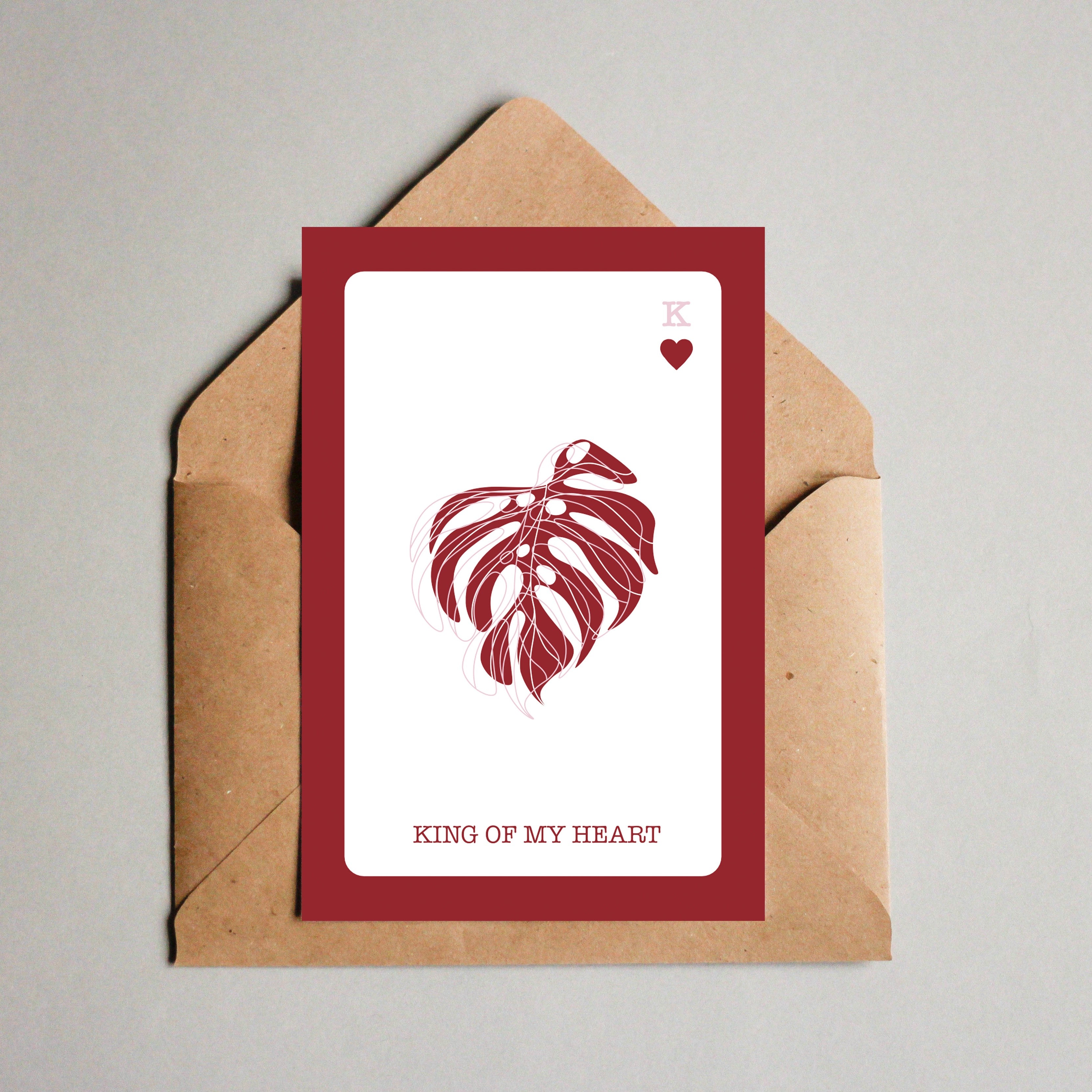 cartão de mensagem romântico para dia dos namorados com mensagem em inglês king of my heart e imagem de uma folha de monstera em forma de coração